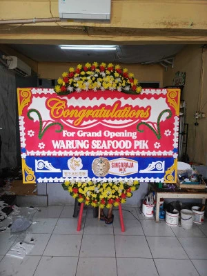 Papan Bunga di Tpu Karet Bivak